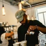 Barista preparing coffee in a modern cafe