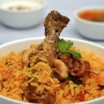 Biryani served in a bowl representing regional biryani traditions in India