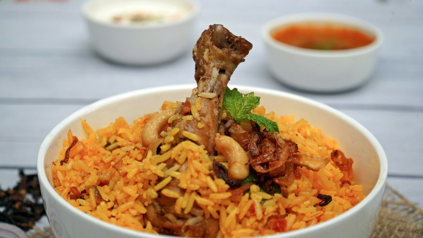 Biryani served in a bowl representing regional biryani traditions in India