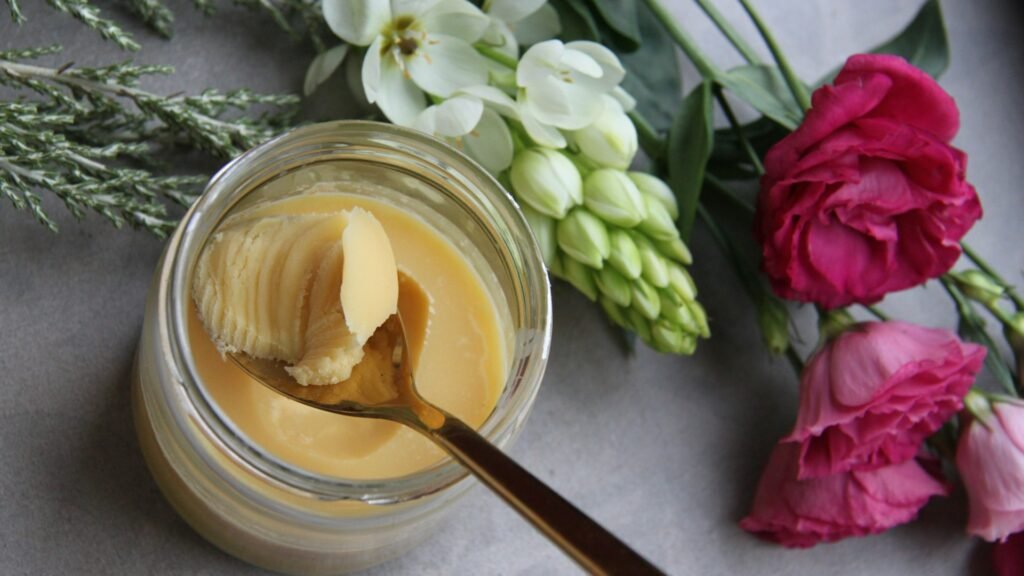 Jar of ghee with a spoon, illustrating a guide to ghee purity testing