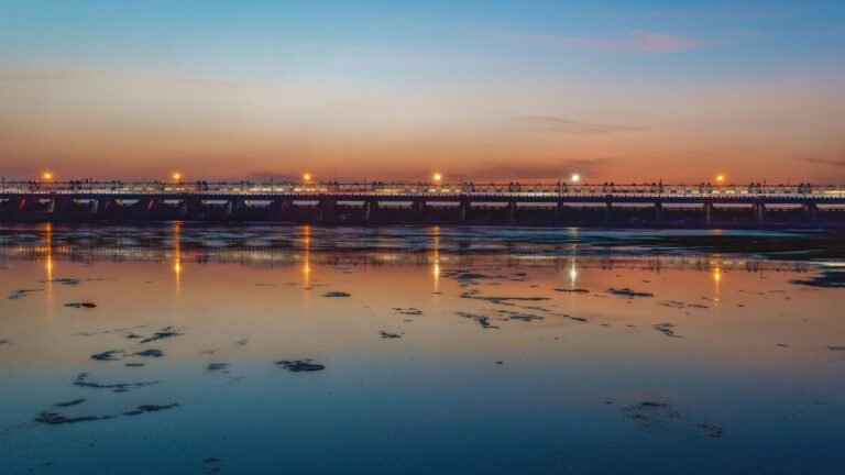 Durgapur Barrage and the river beneath a colourful evening sky