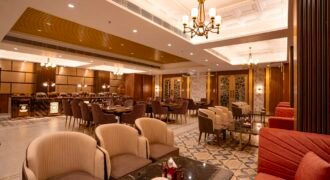 Modern restaurant dining interior with tables and upholstered seating
