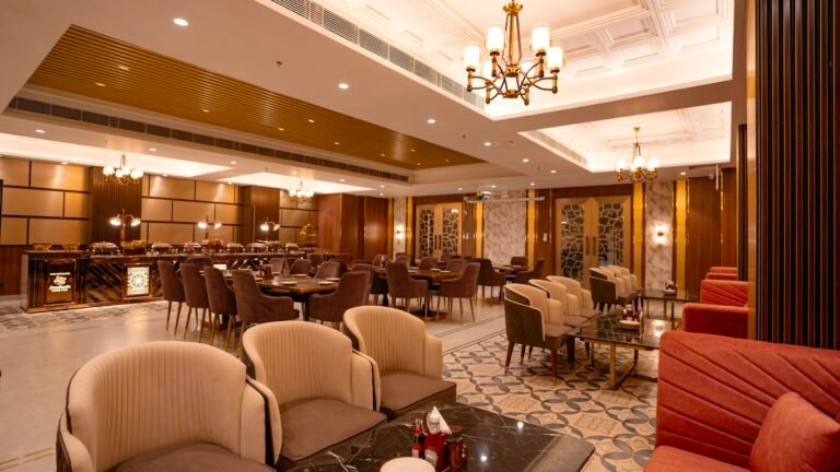 Modern restaurant dining interior with tables and upholstered seating