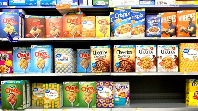 Boxes of breakfast cereal arranged on supermarket shelves in the United States